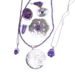 A tray of silver and amethyst stone set costume jewellery, to include brooches, pendants etc