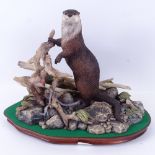 Border Fine Arts River Sentinel Group depicting an otter, on plinth, with certificate, height 28cm