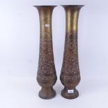 A pair of enamelled Eastern brass vases, 58cm