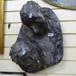 A large Vintage black painted plaster modernist wall-hanging sculpture, 2 faces, unsigned, height