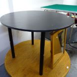 A black ash circular dining table, W100cm, H72cm, together with a metal-framed folding card table,