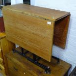 A mid-century Ladderax teak gateleg table with steel frame, by Robert Heal for Staples of