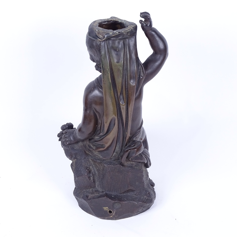 A 19th century patinated bronze sculpture, Classical seated child, possibly originally a lamp - Image 2 of 2