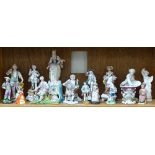 A collection of English and Continental porcelain figures, including mini Clarice Cliff 1993