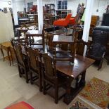 A good quality Ipswich oak design rectangular refectory dining table, with carved frieze, H-shaped