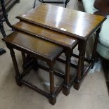 A rectangular oak nest of 3 occasional tables, W56cm, H48cm, D35cm