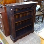 A stained pine open bookcase, W86cm, H105cm, D26cm