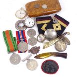 Various collectables, including Second World War medals, silver-cased pocket watch, military badges,