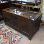 An 18th century joined oak coffer, with panelled front on stile legs, L118cm, H, 60cm, D51cm