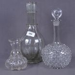 A French glass 4-section decanter, a hand-blown spiked glass decanter and stopper, and another