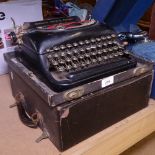A Remington Victor S portable typewriter, in original carrying case