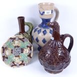 A large German salt glaze water flagon, a Faience dish, and a glazed jar, largest height 32cm (3)