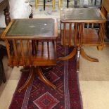 A pair of reproduction mahogany table-top revolving bookcases, with inset tooled leather skivers,