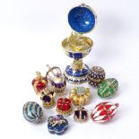 A group of modern enamelled gilt-metal trinket boxes, globe height 15cm