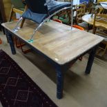 A large rectangular polished and painted pine kitchen table, on turned legs, L180cm, H76cm, D100cm