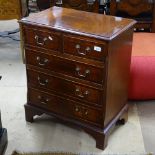 A reproduction mahogany chest of 2 short and 3 long drawers, on bracket feet, W60cm, H72cm, D36cm