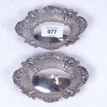A pair of small oval pierced silver dishes, length 12.5cm