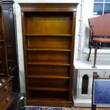 A reproduction mahogany open bookcase with adjustable shelves, W91cm, H182cm
