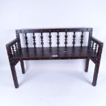 A Vintage oak child's bench/stand, with turned spindles, length 70cm