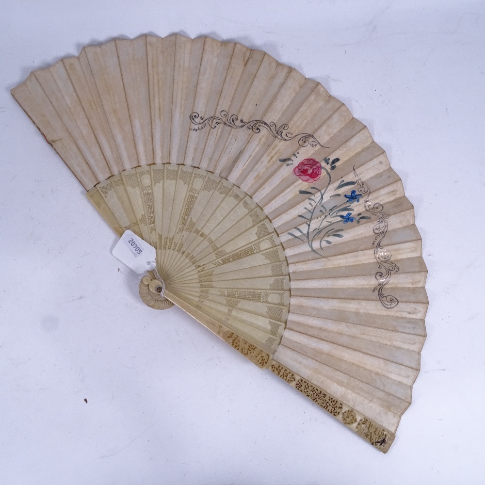 A 19th century Chinese carved and pierced ivory brise fan, hand coloured and gilded engraved - Image 2 of 2