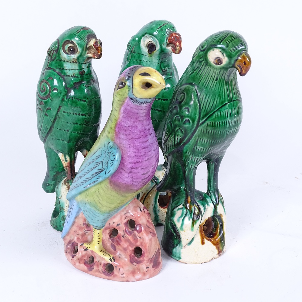 A group of 4 Chinese glazed pottery parrots, largest height 22cm (4)