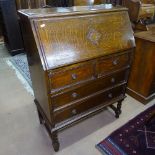 A 1920s oak bureau with 4 drawers, on barley twist legs, W78cm, H107cm, D40cm