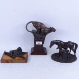 Heredities mare and foal sculpture, a leopard on plinth, and a dog resting on a book