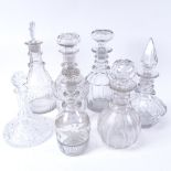 7 glass decanters and stoppers, including etched example dated 1872, height 25cm (7)