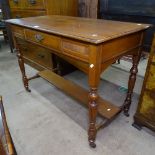 An Edwardian walnut washstand with single frieze drawer, on fluted legs, W106cm, H77cm, D54cm