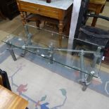 A contemporary industrial style scaffold and tempered glass coffee table of rectangular form,