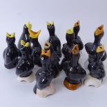 A collection of Vintage ceramic magpie bird pie funnels