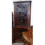 A 19th century mahogany 2-section corner display cabinet, with lattice-glazed doors, W85cm, H212cm