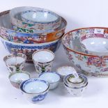 A large quantity of Oriental ceramic bowls and tea bowls, largest diameter 28cm (mostly A/F)