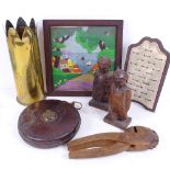 A mixed group of items, including a ring display easel, Scandinavian carved wood nutcrackers, pair