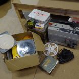 Eumig Super 8 film projector, a Canon FP 35mm camera, tins and film equipment