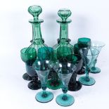 A group of Victorian and later Bristol green glassware, including a pair of decanters, height