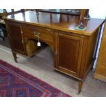 A mahogany and satinwood-strung Edwardian kneehole writing desk, fitted with drawer and cupboards,