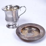 A silver Armada dish, and a boxed engine turned silver christening mug