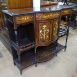 A Victorian rosewood chiffonier base, of bow-front form, with drawers cupboards and open shelves,