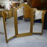 A gilt-framed 3-fold dressing table mirror