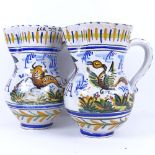 A pair of Spanish Faience water jugs, bull and floral decoration, titled "Agua", height 25cm