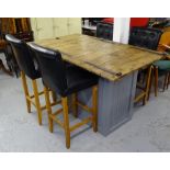 An unusual kitchen island/dining table, with a 19th century pine pub cellar hatch top, on a later