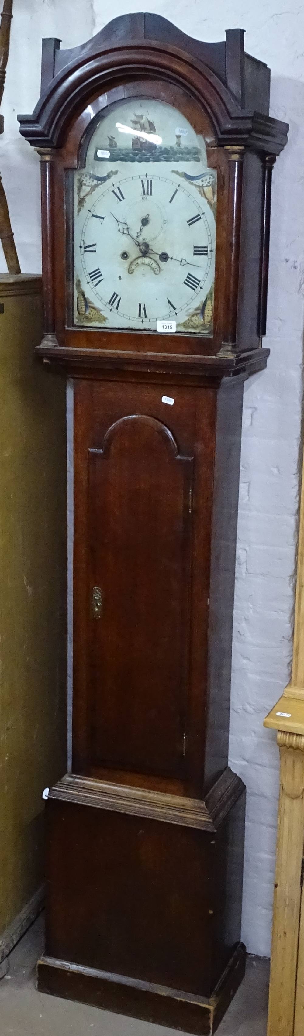 An 18th century 8-day clock, with arch-top painted dial and 2 subsidiary dials, in a cross-banded