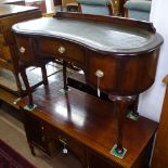 An Edwardian mahogany kidney-shape writing table, with inset shaped leather skiver, 3 drawers, on