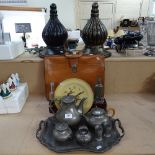 A Dutch pewter tea set on tray, bottles, a briefcase, a pair of composition wall brackets, and a