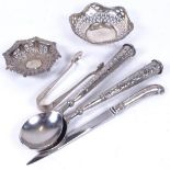 A pair of Continental white metal salad servers, 2 small pierced silver dishes, silver tongs, and