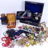 A Victorian leather fitted jewelbox, and a quantity of mixed costume jewellery