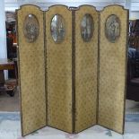 An Antique upholstered 4-fold draught screen, with shaped top and circular Cries of London panels,