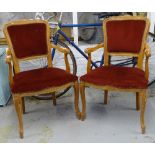 A pair of French beech open arm bedroom chairs