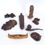 A group of carved wood items, including an Iona driftwood knight design wall ornament, length